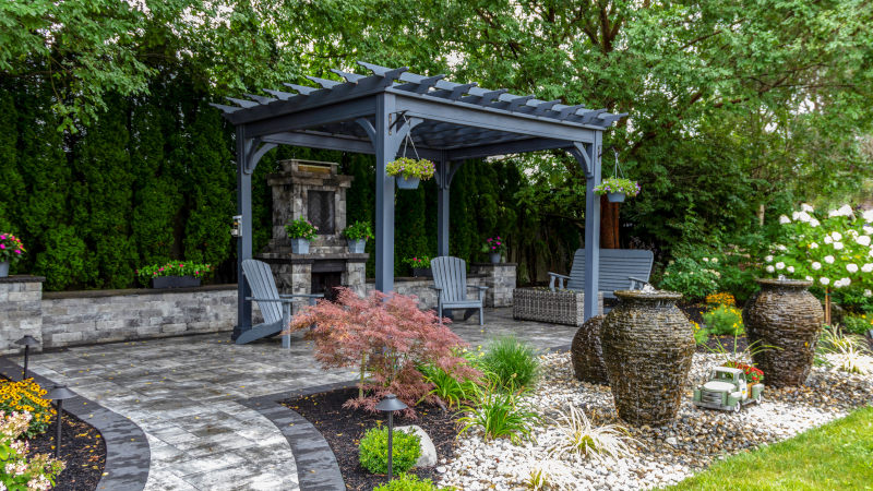Garden pergola covering outdoor seating on a patio
