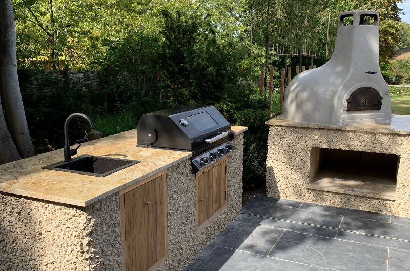 bespoke outdoor kitchen with Beafeater BBQ and pizza oven
