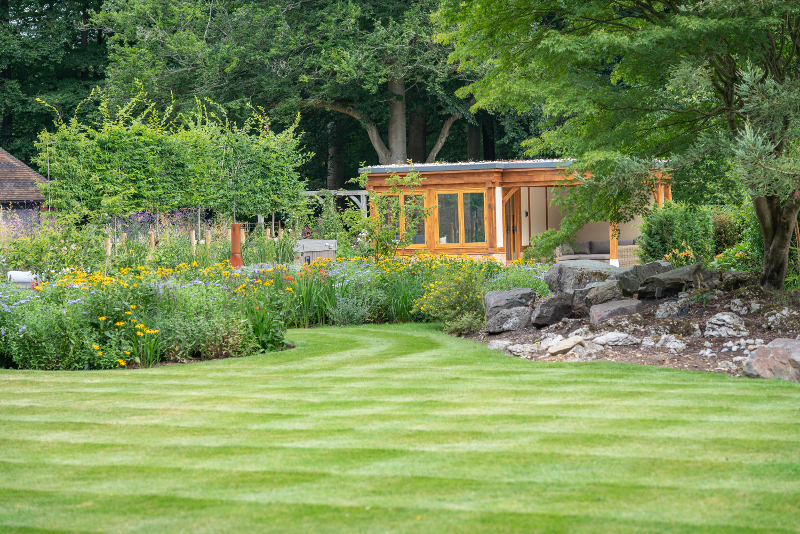 Garden room set in landscaped garden