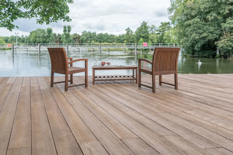 Seats on private riverside deck with view of weir